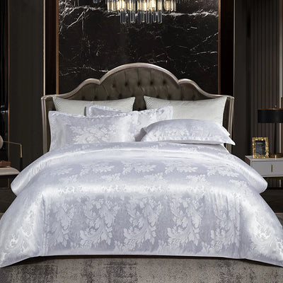 Housse de couette satin jacquard blanc sur lit double