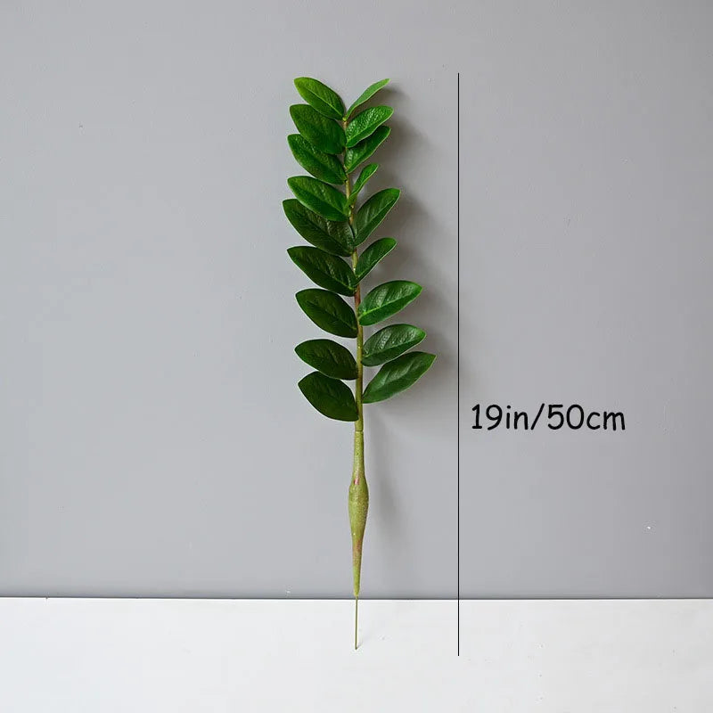 plantes artificielles branches vertes feuilles simples extérieur moderne pot blanc exposé