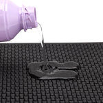 tapis coiffeur antidérapant noir or outils rangement surface texturée professionnel utilitaire