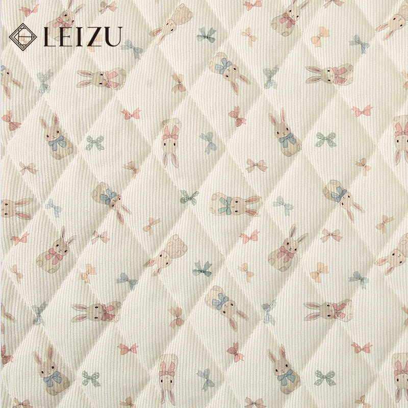 tissu imprimé fleurs lapins blanc rose vert bleu clair vintage enfantin résistant déchirure bricolage
