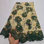 tissu dentelle brodée sequins dorés florals jaune vert rose rouge translucent traditionnel erotique echangiste