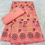 tissu dentelle coton brodé fleurs motif broderie africaine voile suisse vêtement élégant
