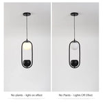 suspension végétale moderne plante artificielle lumière sphère lumineuse noir blanc vert minimaliste