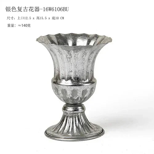 vase métal argenté ornements floraux classique décoration mariage table arrangement fleurs