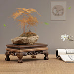 support décoratif bois sculpté motifs floraux marron foncé artisanal traditionnel