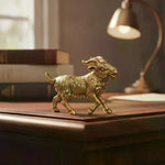 statuette chèvre jaune doré résine décorative cornes détaillées intérieur traditionnel animalier