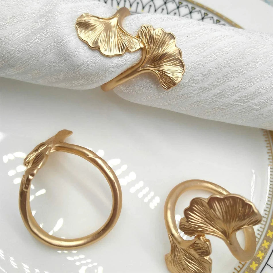boucles serviette métal feuilles gingko or cuivre classiques mariage décoration table élégante anniversaire événement