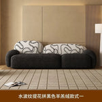 canapé moderne noir blanc fleurs motifs abstraits coussins plateau bois minimaliste italien scandinave