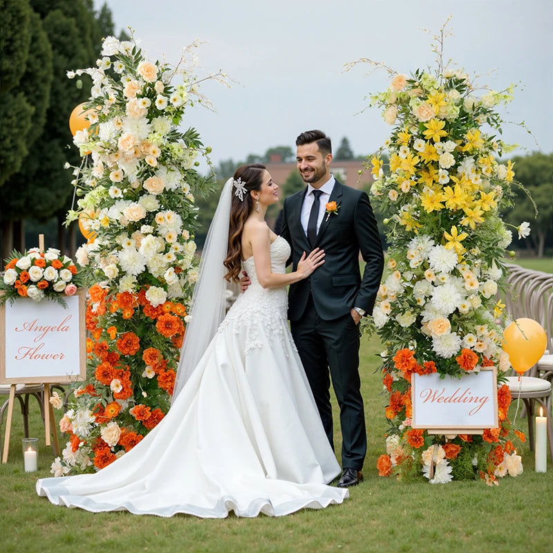 arche fleurs mariage deco exterieur blanc orange vert classique festif