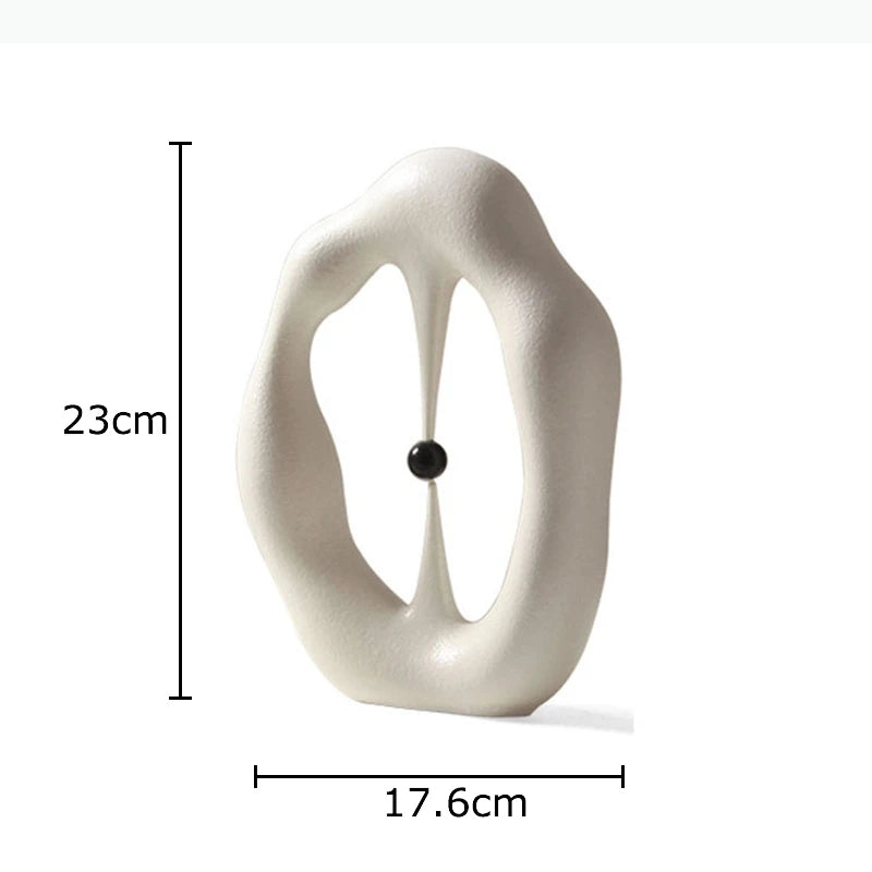 sculpture abstraite contemporaine blanc gris minimaliste texture mat forme organique noire central