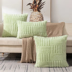 coussins décoratifs modernes texture duveteuse motifs rectangles couleurs vert menthe beige rose blanc gris