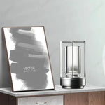 lampe torche moderne led transparente noir doré base métallique minimaliste lumière ambiance camping restaurant