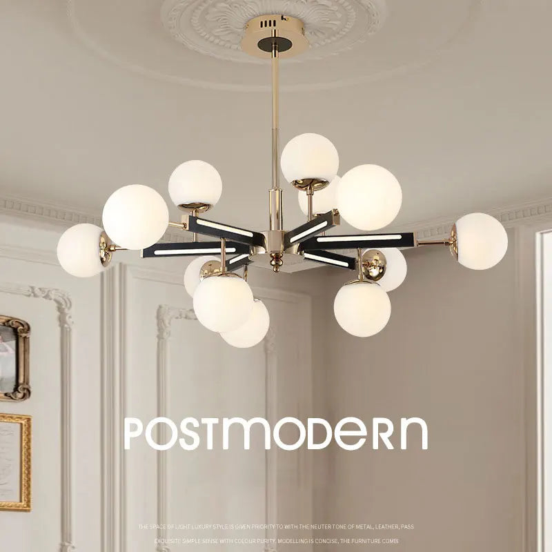 suspension lumineuse moderne or noir blanc sphères translucides structure métallique fixée lumière led