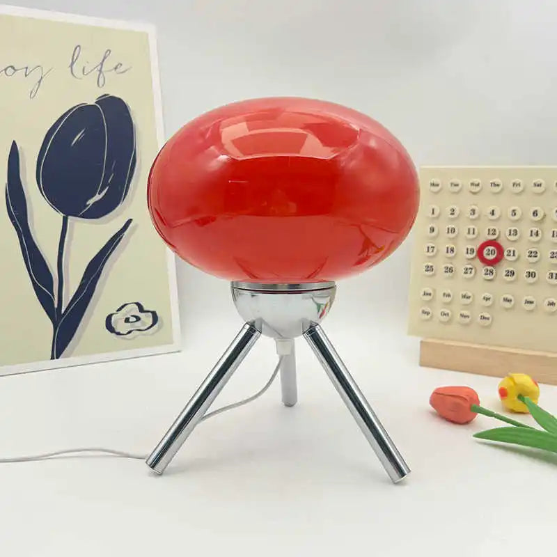 lampe table moderne rouge verre mat pieds métalliques flux lumineux led blanc orange verte
