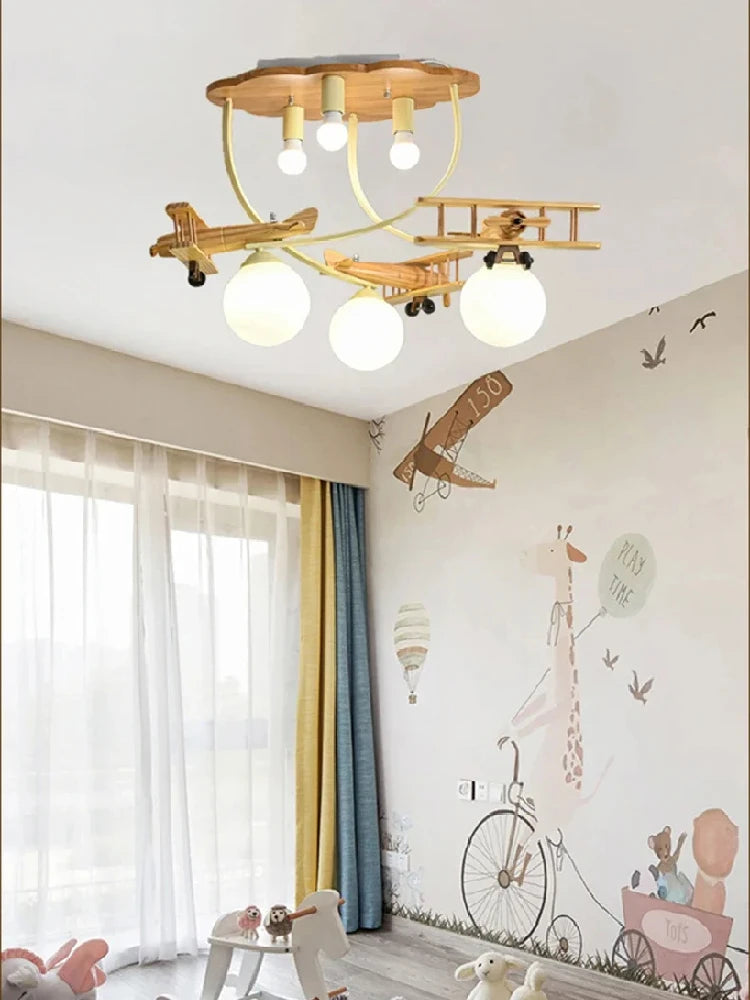 lampe bois naturel avions sphères translucides vintage moderne chambre enfants
