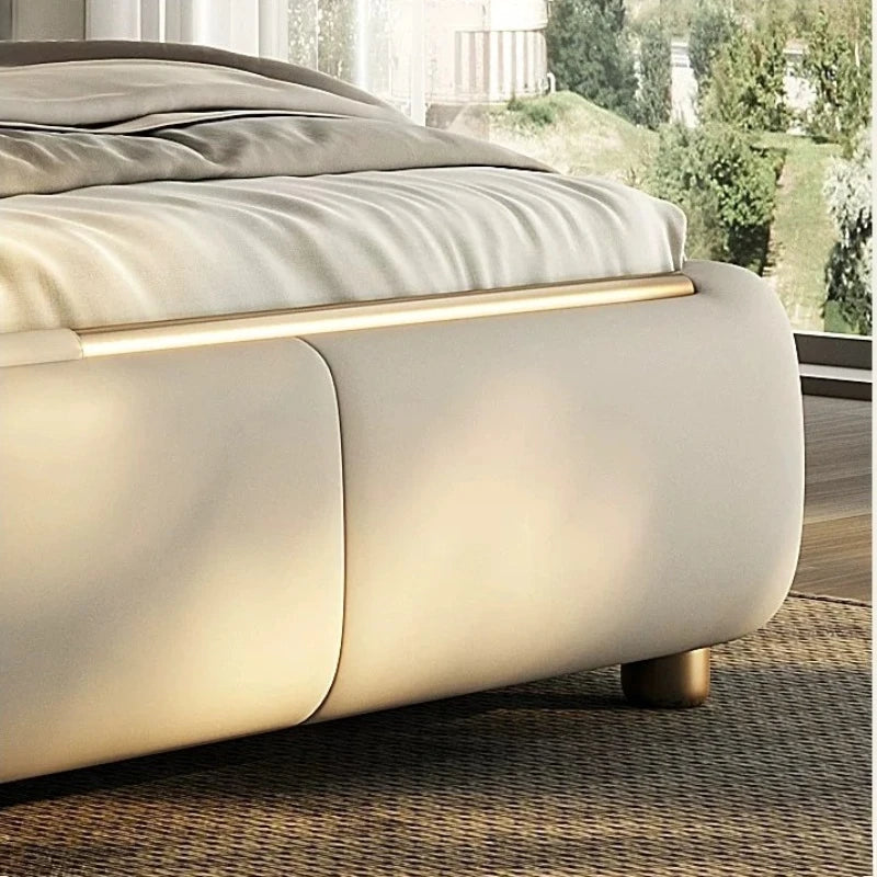 lit double coffre intégré moderne minimaliste tissu mat bois texturé touches dorées pieds métal