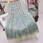 jupe vert clair broderie florale élégante romantique translucide décontractée femme mi mollet