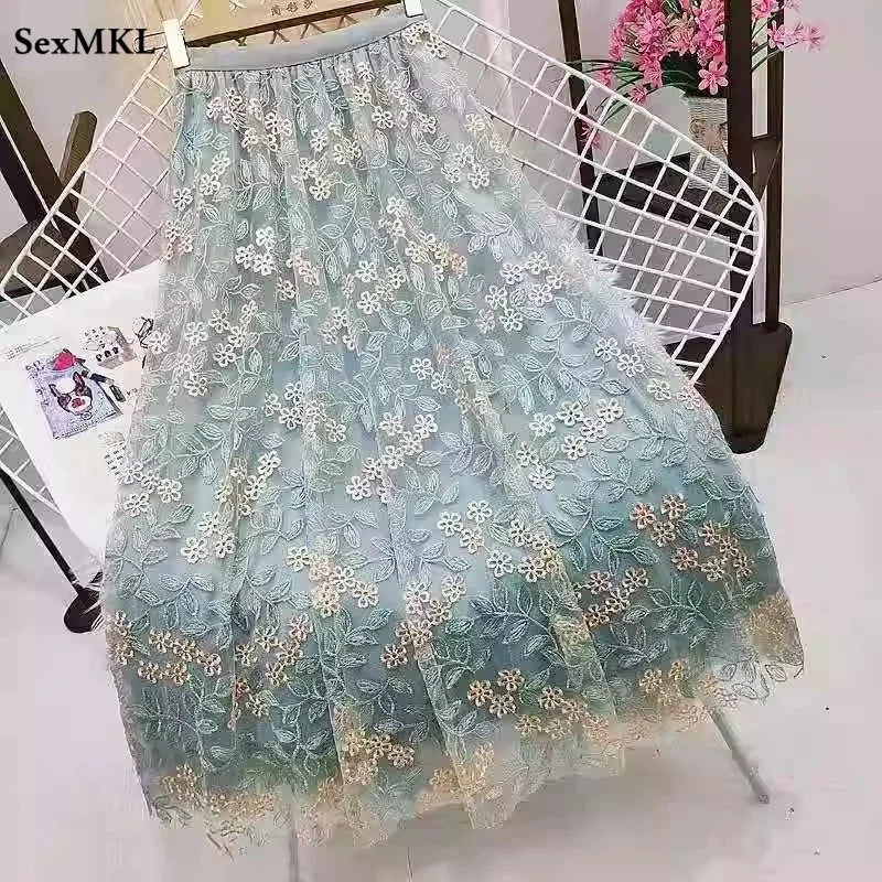 jupe vert clair broderie florale élégante romantique translucide décontractée femme mi mollet