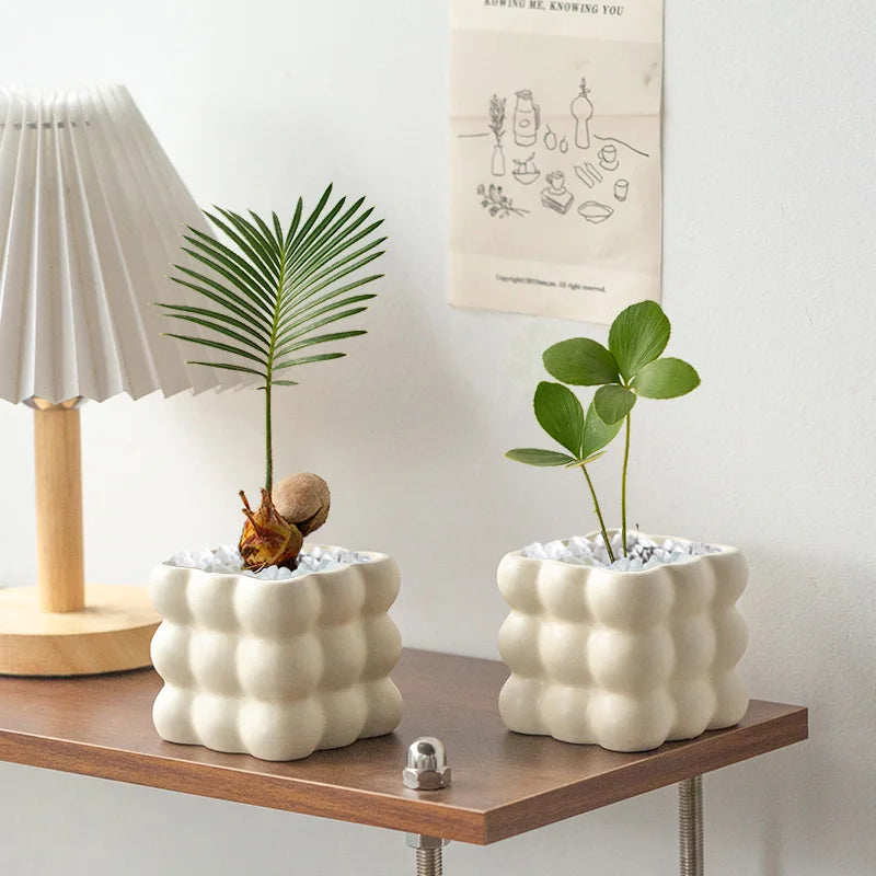 pots fleurs modernes résine beige formes bulles décoration intérieure plante artificielle gravier blanc minimaliste