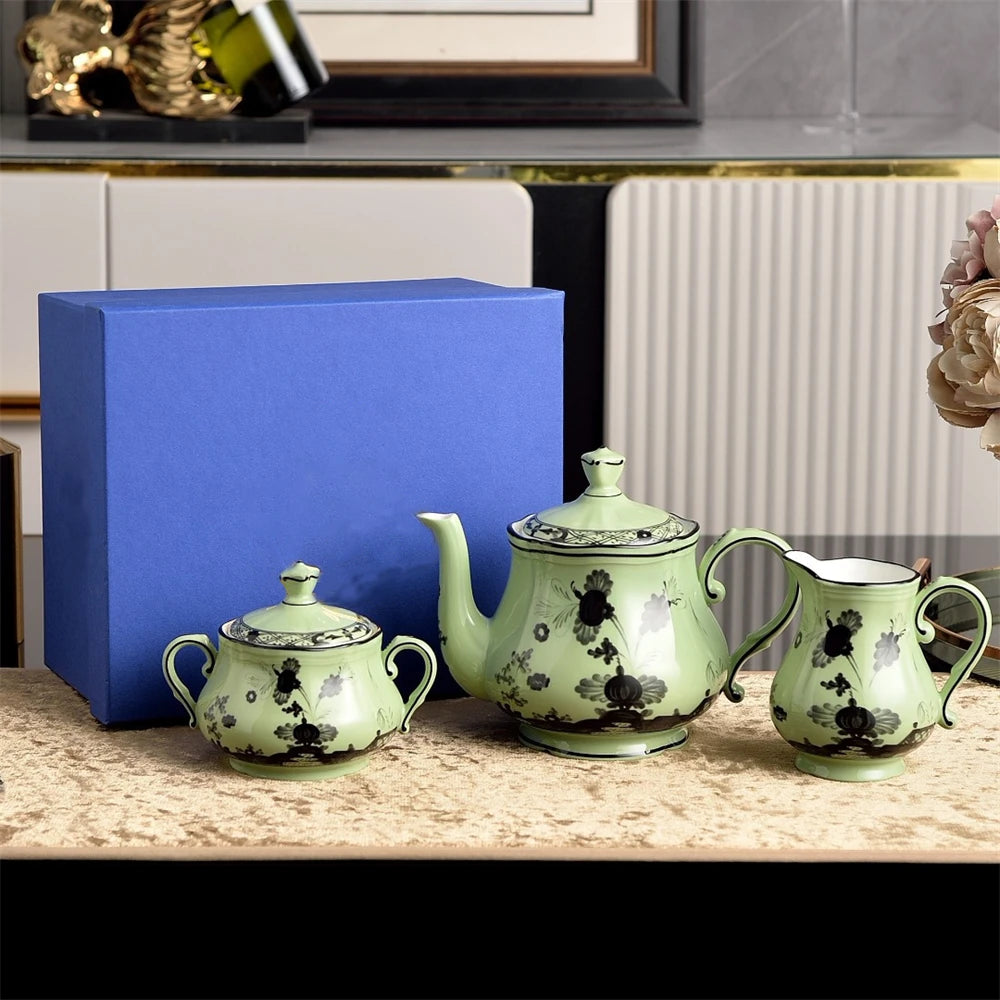service thé vaisselle céramique rose vert jaune fleurs bleues classique soucoupe assiette pot sucre