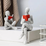 statue résine femme lisant blanc noir livre rouge texture papier imprimé minimaliste décoration erotique