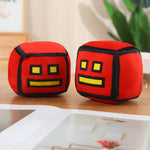 peluche cube dessin animé visage sourire couleur rouge jaune vert rose bleu noir