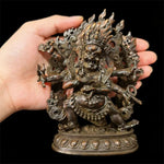 statue religieuse tibetaine bronze figurine details sculptés elements feu crâne base decorée poids indiqué