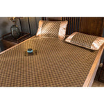 matelas sommeil rotin bambou beige marron carreaux géométriques coussins lit double