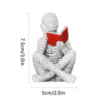 statue résine femme lisant blanc noir livre rouge texture papier imprimé minimaliste décoration erotique