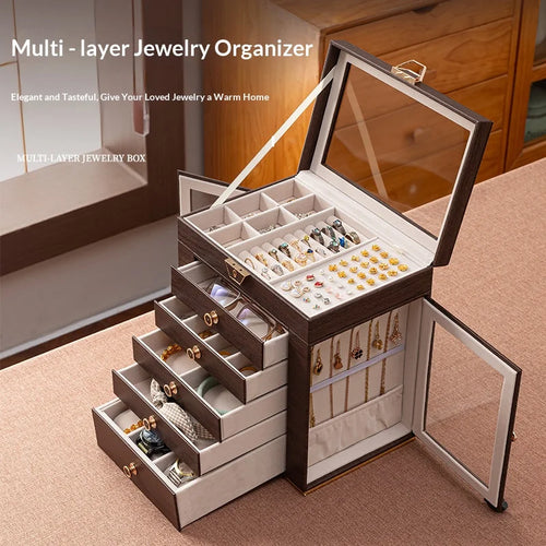 boîte bijoux multi niveaux marron foncé grain bois verre transparent poignées dorées élégante rangement