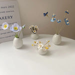 vases décoratifs modernes couleurs blanc rose vert bleu violet rond lissesintérieur maison