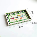 assiettes plates mosaïque multicolore artisanal rangement blanc vert bleu noir rouge triangles