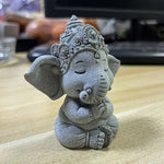 statue artisanale figurine éléphant pierre gris texture granulée statuette décoration maison