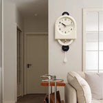 horloge murale moderne minimaliste aiguilles balancier noir blanc rouge