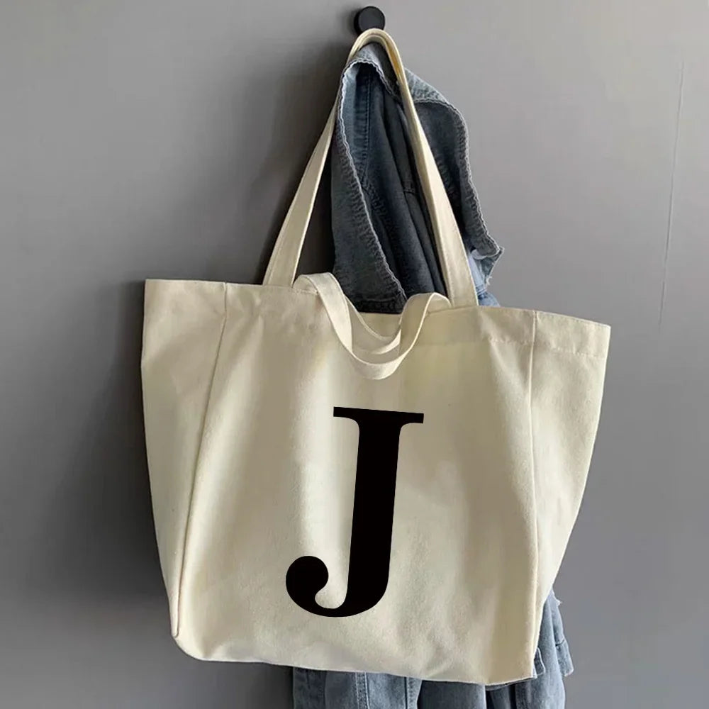 sac main femme toile beige clair lettre noire poignées détachables