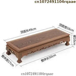 support bois sculpté table basse vase plantes traditionnel asiatique trépied
