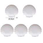 assiettes blanches modernes céramique lisses rangement présentation alimentaire set tailles différentes