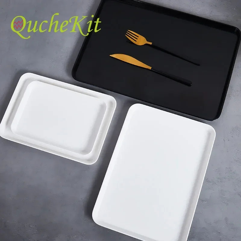 assiettes plats modernes blanc noir cuisine rangement fruits desserts petit déjeuner