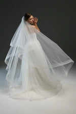 voile mariée blanc deux couches bord coupé tulle fin texture élégante invisible fixations jupe