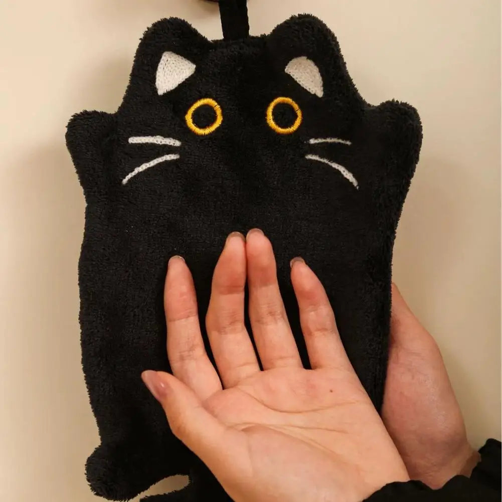sac main noir chat yeux jaunes moustaches blanches oreilles blanches poignée