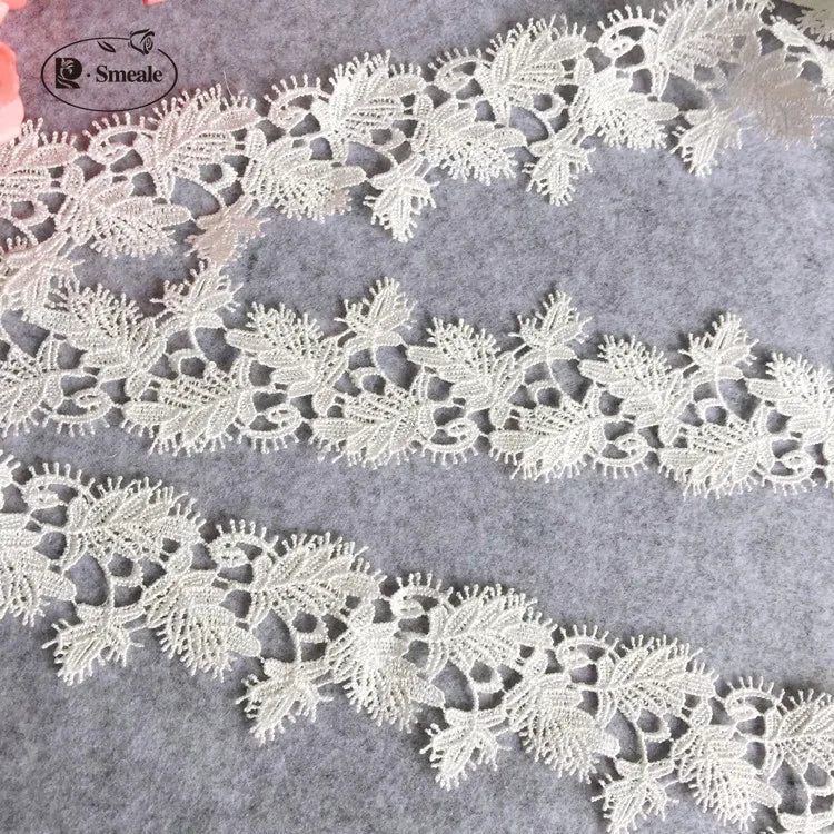 dentelle polyester feuilles stylisées broderie fine 5.8cm large blanc opacité yards yards off white