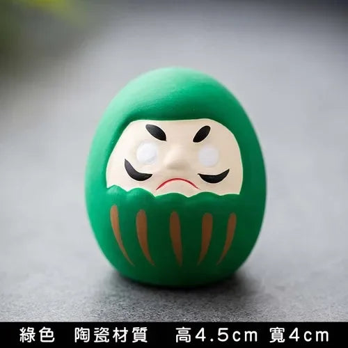 statue daruma gris relief sculpté artisanal traditionnel maison décoration bouddhiste