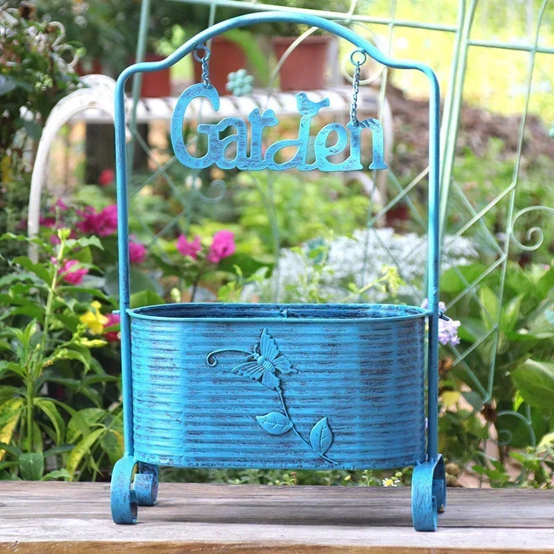 support fleurs métal vieilli pot suspendu signe garden gravures feuilles papillons fleurs blanches jaunes
