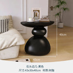 table basse ronde pierre moderne minimaliste sculptural couleur vive salon