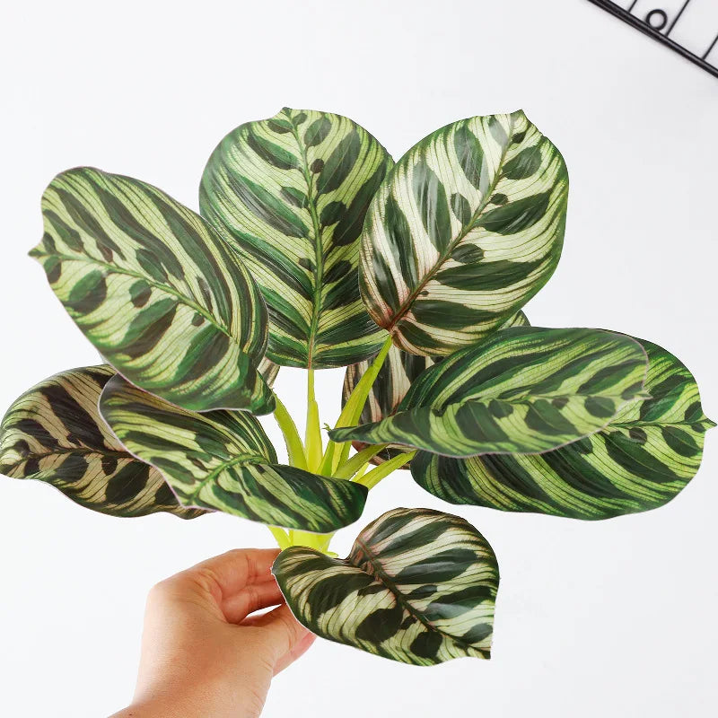 plantes artificielles vertes feuilles décoratives intérieur moderne minimaliste rouge blanc marron motifs végétaux