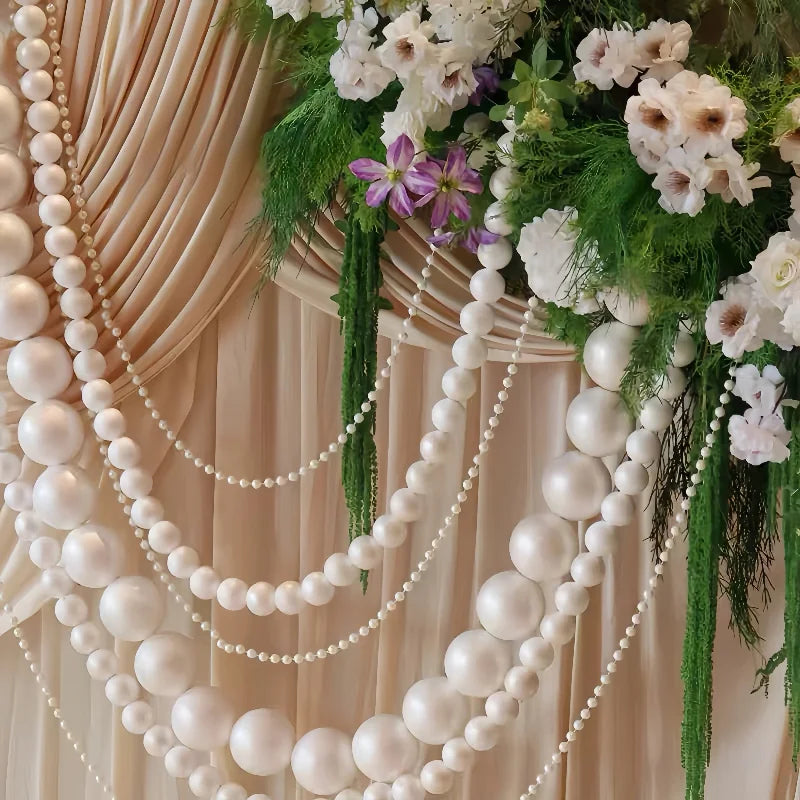 décoration événementielle guirlande nacrées tissu semi transparent motifs floraux couleurs vives festives mariage anniversaire