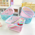 panier rangement rose clair bleu pastel poignées détachables rangement moderne utilisation multiple plastique organiser