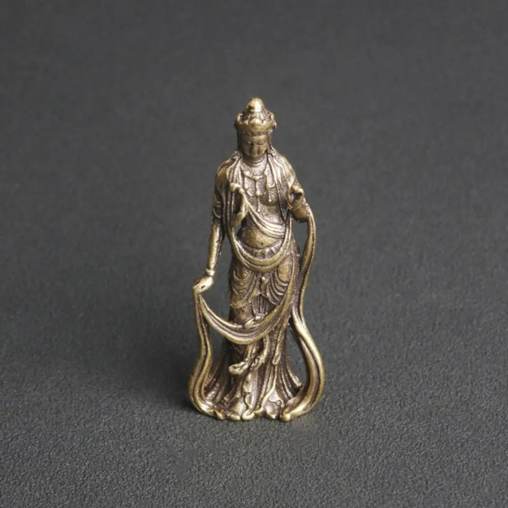 statue bouddhiste miniature dorée traditionnelle relief détails vêtements bronze religieux