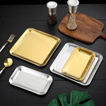 assiettes modernes or argent lisses salon décoration fourchettes cuillers