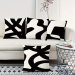 taies d'oreiller imprimées motif abstrait noir blanc contemporaines 45x45cm opaques maison hospitalière